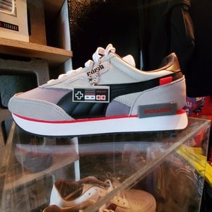 Grey and black Future Rider NES super Mario pumas